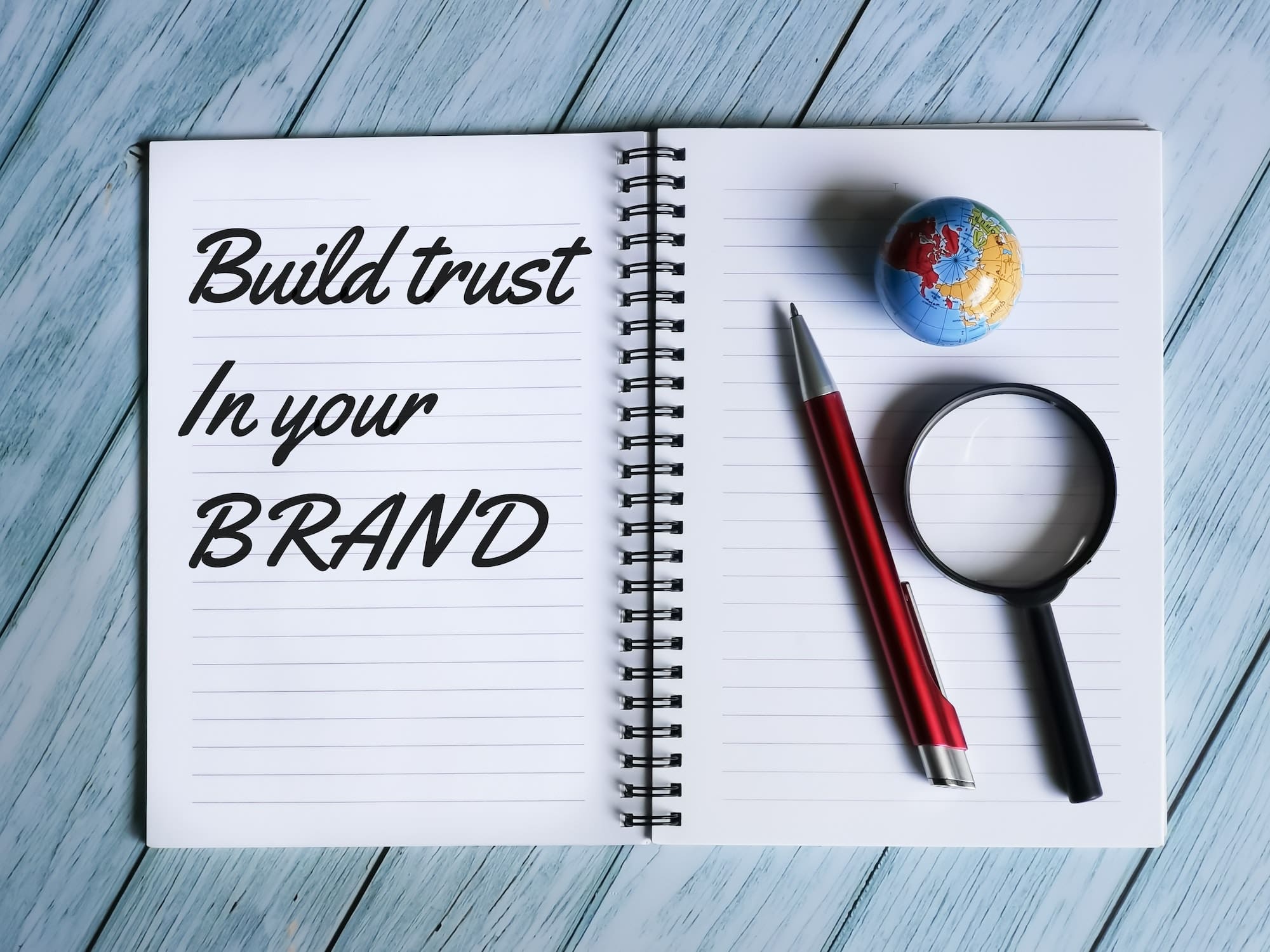 notebook written build trust in your brand
